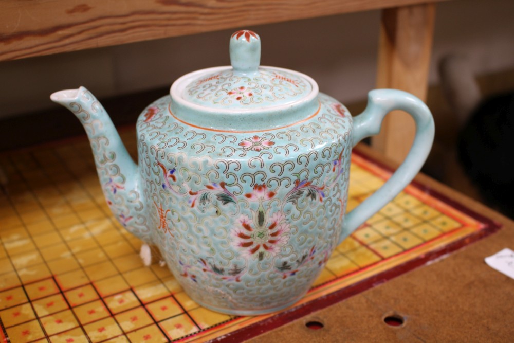 Three Chinese blue and white prunus pattern ginger jars, two other jars and ten assorted teapots